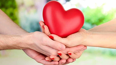 heart-being-held-by-male-and-female-hands