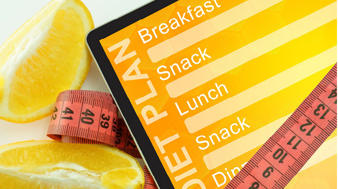 饮食计划橙子卷尺测量